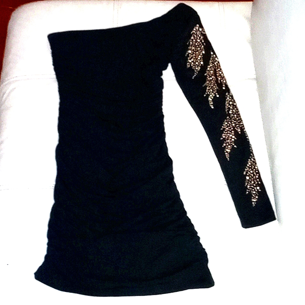 A Very Unique & Sexy Women's Black dress